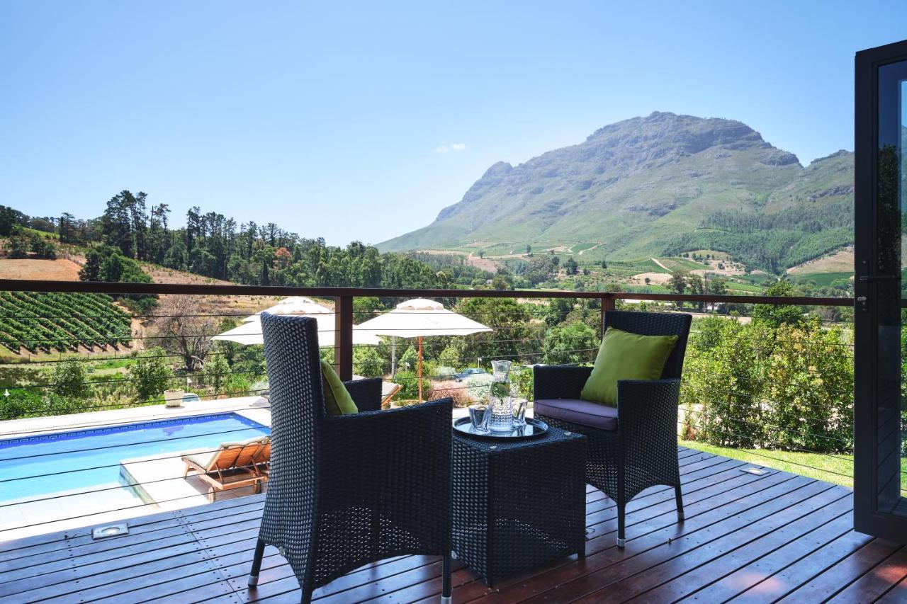 Alluvia Boutique Winery & Luxury Accommodation Stellenbosch Exterior photo View of the Hottentots-Holland Mountains from the Cape Winelands