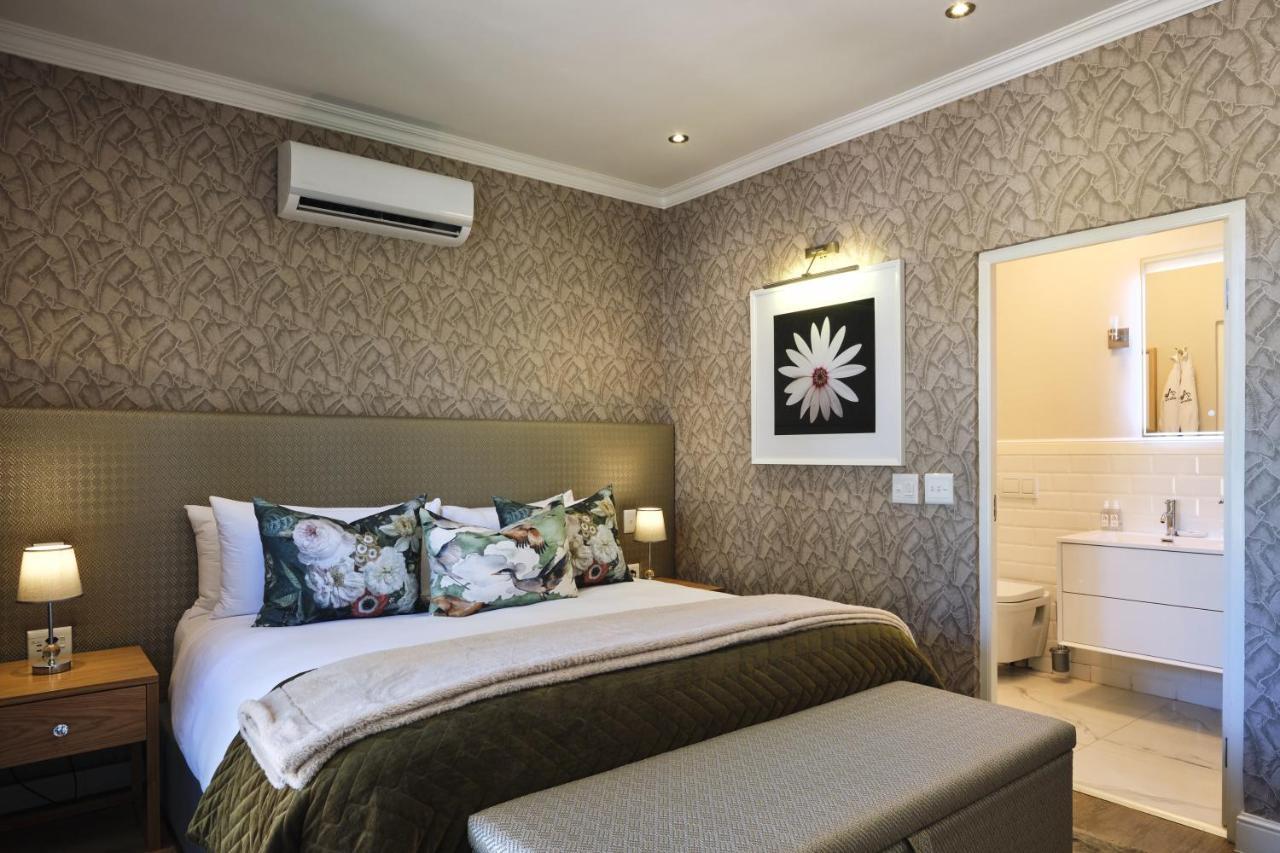 Alluvia Boutique Winery & Luxury Accommodation Stellenbosch Exterior photo A bedroom at the Cape Heritage